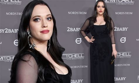 Kat Dennings puts on very busty show in low